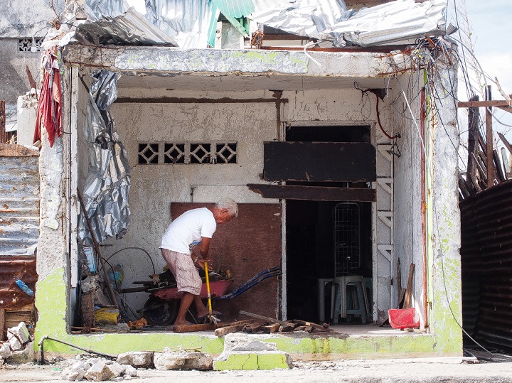 Survivors tried to salvage as many building materials as possible, including wood, corrugated iron sheeting and even nails so that they could repair their homes as quickly as possible. Photo credit: Timo Luege